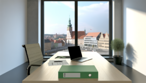 Rejestracja BDO Toruń — biuro z laptopem i dokumentami na tle panoramy miasta